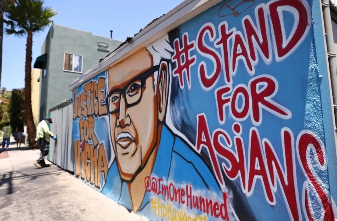 A Stand for Asians mural painted on a San Francisco wall